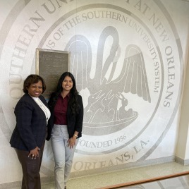 Executive Director, Angel Wright-Lanier alongside Accreditation Manager, Fabiola Bachinelo